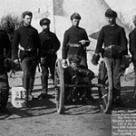 Soldiers pose with three of the four Hotchkiss Guns used against the Lakota at Wounded Knee. Photo by Grabill, Deadwood, South Dakota. The cannon are Hotchkiss Mountain Guns of 1.65 in. They are sometimes referred to as Mountain Rifles.