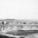 "Reenactment of U.S. troops surrounding the Lakota at Wounded Knee (1913)"